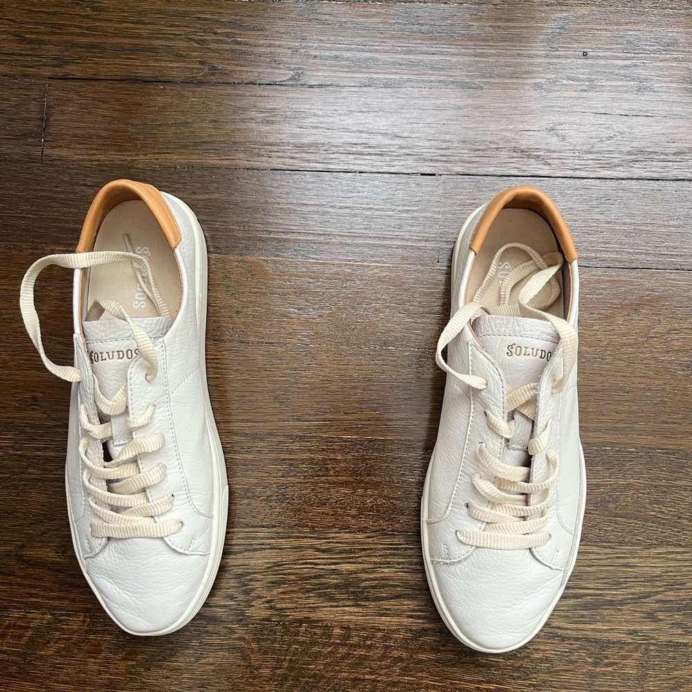 Cleaning out. White leather sneakers in great condition. Only worn a few times.